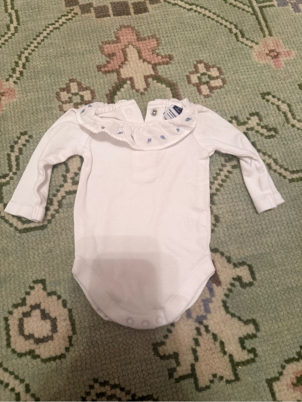 Long-Sleeve White Ruffle Neck Baby One-Piece
